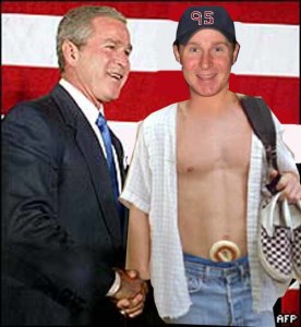 Jud shakes hands with President Bush and shows off his war trophy's Pat's Hair Cutting Shoes and the Bagel in his pants that represents shutting out Pat in the finals.