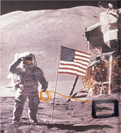 Travis looks for an outlet on the moon.